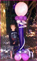 pink purple twisted balloon column